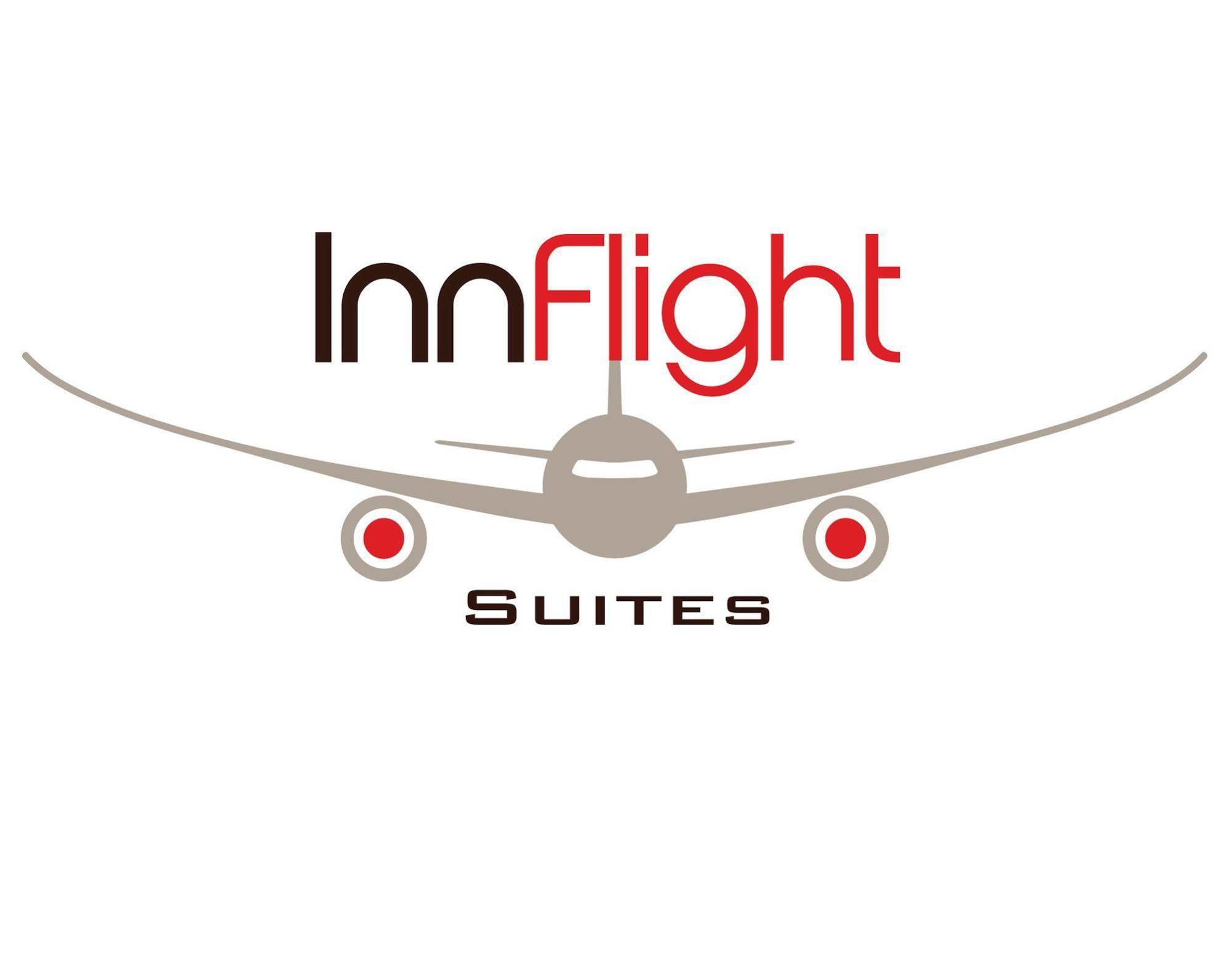 Inn Flight Suites Piarco Esterno foto