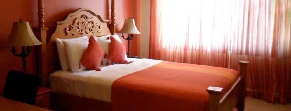 Inn Flight Suites Piarco Esterno foto